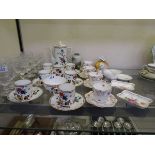 An assortment of ceramic tableware to include Salon China coffee set, Coalport trios, Royal Crown