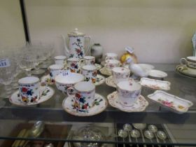 An assortment of ceramic tableware to include Salon China coffee set, Coalport trios, Royal Crown