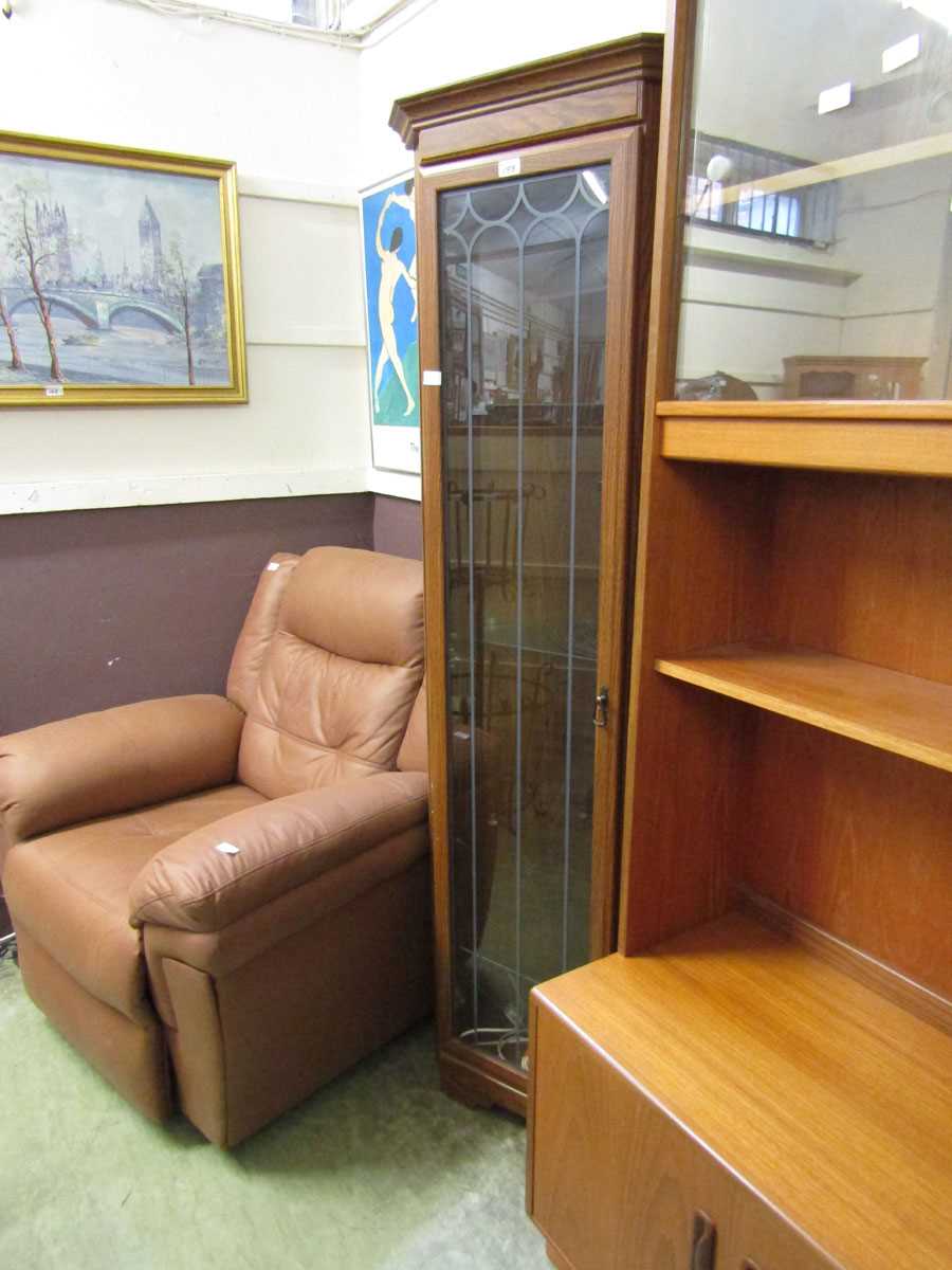 An oak effect full height glazed door corner display cabinet