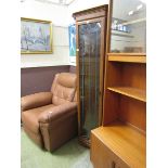 An oak effect full height glazed door corner display cabinet