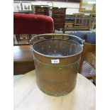 A brass and copper banded coal bucket