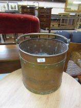 A brass and copper banded coal bucket