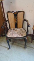 An early Victorian Japanese chinoiserie design open armchair with bergere back