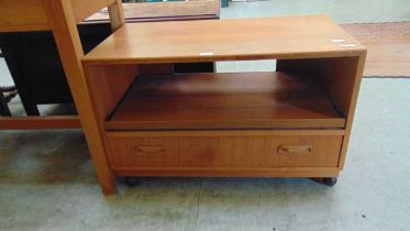 A teak G-Plan TV stand with pull out slide and drawer below approx 53cm