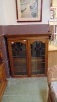 A mid-20th century leaded glazed door display cabinet approx 106cm