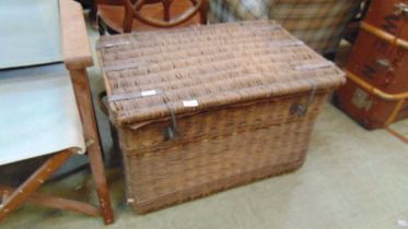 An early 20th century wicker laundry basket approx 51cm