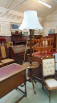 An early 20th century walnut carved standard lamp with drinks tray approx 157cm without the shade