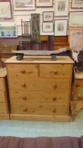A waxed pine chest of two short over three long drawers approx 99cm
