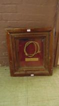 A framed and glazed piece of cable, possibly used by George Bernard Shaw, approx 66cm