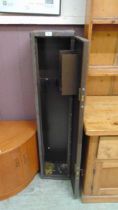 A metal gun cabinet with two keys approx 128cm