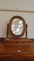 A waxed pine dressing table mirror with two trinket drawers