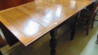 An unusual mid-20th century oak extending fold over dining table Dimensions: H, 78cm , W, 92cm ,
