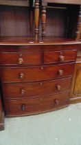 A Victorian style mahogany bow fronted chest of two short over three long graduated drawers