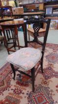 A Victorian ebonised bedroom chair