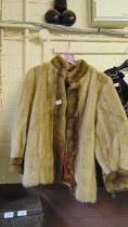 A ladies' brown fur coat