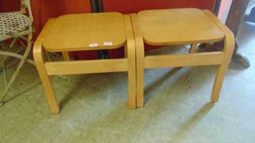 Two modern beech effect bent wood stools