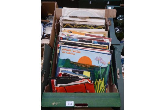 A tray of LPs and 45RPM records by various artists to include Milk and Honey, Carpenters, Cliff