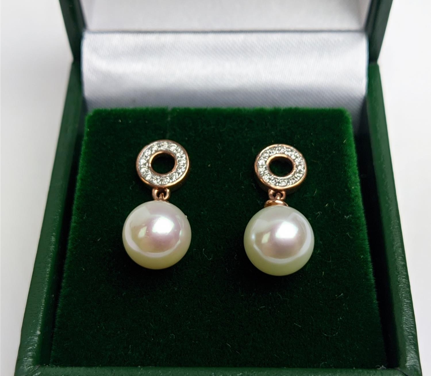 A PAIR OF 9CT GOLD CULTURED PEARL AND DIAMOND DROP EARRINGS, the pearls of 8mm diameter, complete