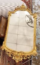 WALL MIRROR, 153cm H x 89cm W, 19th century French giltwood and gesso, circa 1870, with shaped old