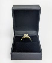 A DIAMOND SOLITAIRE RING, the old mine cut stone of approximately 1.50 carat, yellow metal shank,