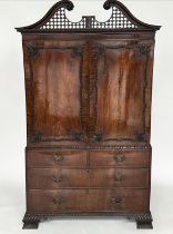 LINEN PRESS, 18th century George III figured mahogany with swan neck cornice, carved panelled
