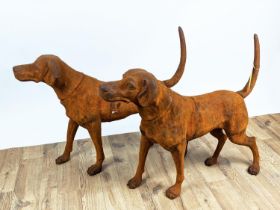 CONTEMPORARY SCHOOL SCULPTURAL DOGS, a pair, cast metal, oxidised finish, 91cm x 21cm x 75cm. (2)