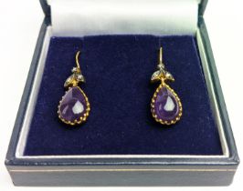 A PAIR OF 9CT GOLD AMETHYST AND DIAMOND DROP EARRINGS, each with a pear shaped amethyst cabochon
