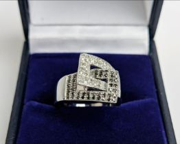 A 9CT WHITE GOLD DIAMOND RING, SET WITH BLACK AND WHITE DIAMONDS, mid century style, total diamond