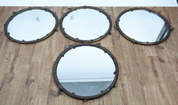 WALL MIRRORS, a set of four, gilt metal frames with tree branch design, 63cm diam each. (4)