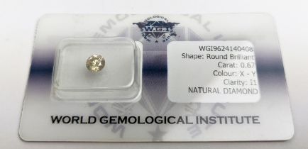 A CERTIFIED SINGLE LOOSE DIAMOND, round brilliant cut, 0.67ct, colour X-Y, clarity I1, fitted in a