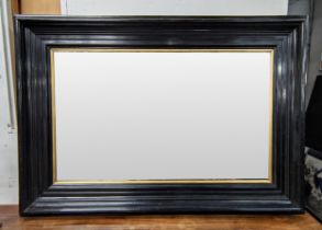 WALL MIRROR, 19th century ebonised with gilt slip, 164cm x 115cm.