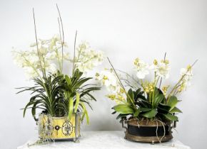 FAUX ORCHID DISPLAYS, a set of two, largest 93cm H approx, together with a faux floral display. (3)