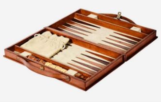 BACKGAMMON SET, in leathered case, 7cm x 23cm x 40cm.