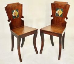 HALL CHAIRS, a pair, Regency mahogany each heraldic panelled back and sabre front supports, 39cm