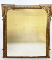 OVERMANTEL MIRROR, late 19th century giltwood and composition rectangular with arched and beaded