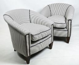 TUB CHAIRS, 73cm H x 71cm W, a pair, newly upholstered in close nailed and piped ticking upholstery.