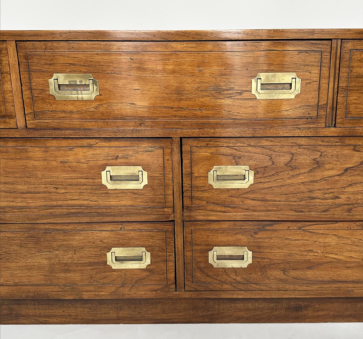 LOW CHEST, campaign style elm and brass bound with seven drawers, 143cm x 46cm x 73cm H. - Image 6 of 9