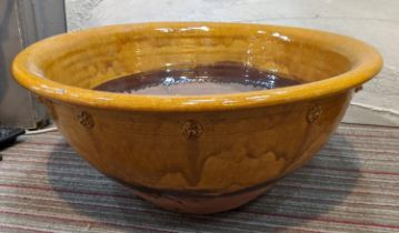PANCHEON/DAIRY BOWL, of substantial proportions, antique French provincial glazed terracotta, 68cm