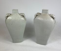 CHINESE CELADON VASES, a pair, each having incised foliate decoration with stylised fish, 55cm H. (