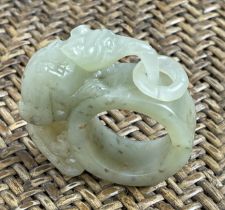 JADE ARCHERS RING, with carved mythical beast.