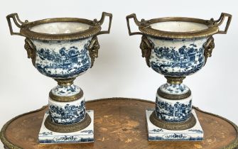 JARDINIERES, a pair, 18th century style Chinese export, blue and white porcelain and gilt metal