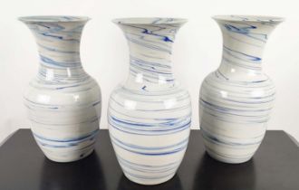 PAOLO MOSCHINO LIGHT BLUE AND WHITE SWIRL DESIGN VASES, a set of three, 41.5cm H. (3)