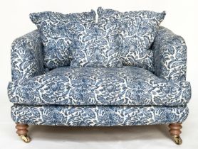 RITZ SOFA, two seater in torosay indigo blue upholstery and turned front supports, 125cm W.
