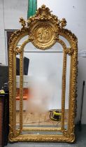 WALL MIRROR, Belle Époque style gilt, frame with mirrored detail, bevelled plate, 214cm x 105cm.