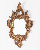 WALL MIRROR, 71cm H x 43cm, Italian giltwood in Rocaille carved frame.