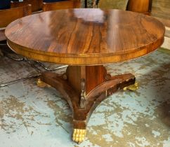 BREAKFAST TABLE, Regency rosewood, parcel gilt and brass mounted with circular top, paw feet and
