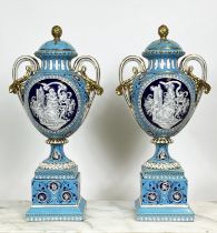 VASES AND COVERS, a pair, late 19th century pate-sur-pate and gilt decorated on a sky blue ground,