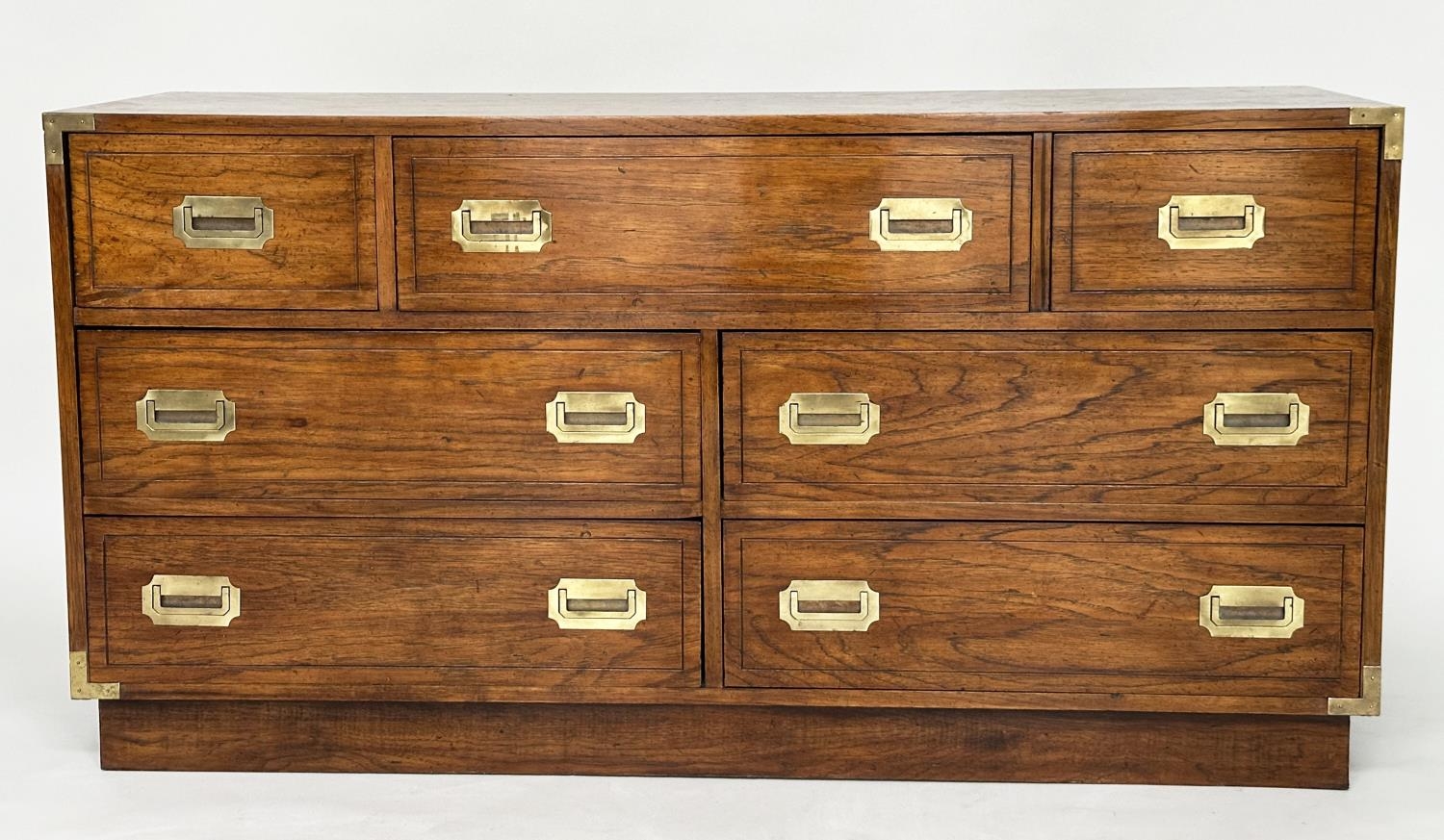 LOW CHEST, campaign style elm and brass bound with seven drawers, 143cm x 46cm x 73cm H. - Image 2 of 9