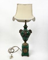 URN LAMP, Neo-Classical style faux malachite with rams head mounts and classical figural cartouches,