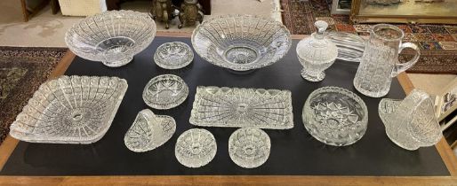A COLLECTION OF CUT CRYSTAL GLASS, including a water pitcher lidded bowl, baskets, trays, etc. (Qty)